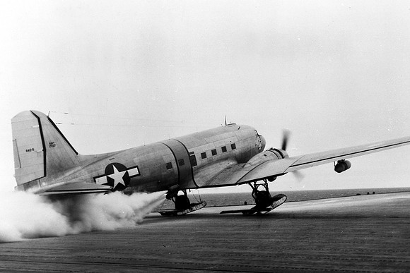 US Navy Douglas C-47H Dakota 17237 with JATO packs launching off aircraft carrier