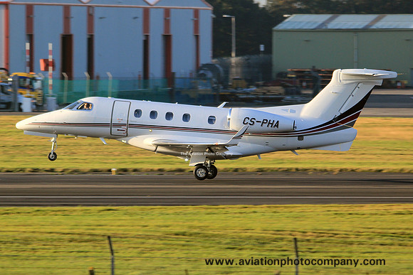 Netjets Embraer Phenom 300 CS-PHA at Prestwick (2015)