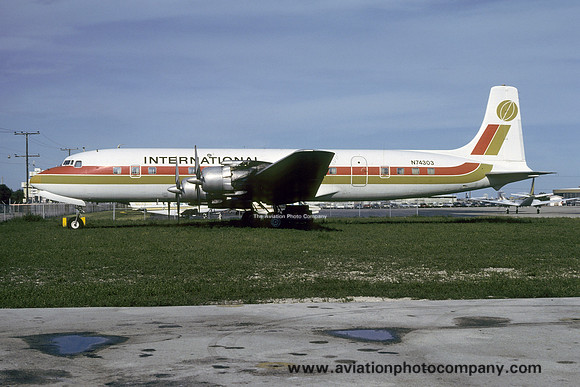 Club International Douglas DC-7C N74303 at Miami IAP (1976)
