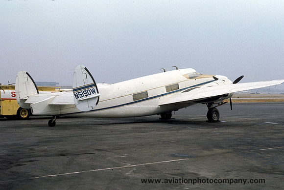 US Civil Lockheed 18 N519DW stored at Daugherty Field Long Beach (1975)